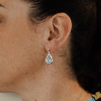 Silver Swirl Blue Topaz Drop Earrings