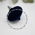 Twisted Silver Bangle