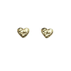 Heart-shaped gold earrings on a white background