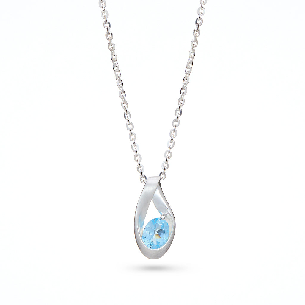 Silver Ribbon Blue Topaz Pendant